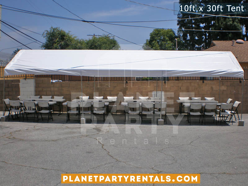 10ft x 30ft Party Tent shown with rectangular tables and plastic white chairs