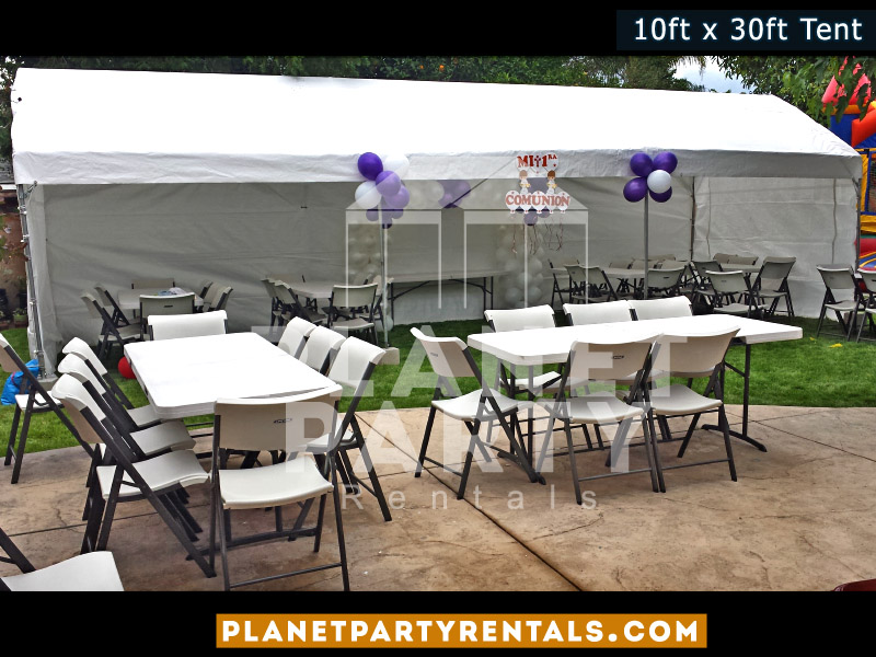 10ft x 30ft Party Tent shown with rectangular tables and plastic white chairs